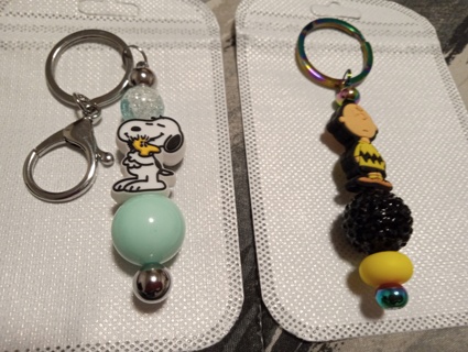 2 New Keychains - Snoopy+ Charlie Brown 