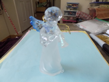 4 inch clear and frosted angel ornament blue tipped wings blowing a horn