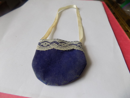 Child's necklace blue pouch trimmed in lace