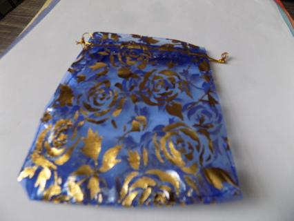 Blue organdy drawstring jewelry bag with gold roses