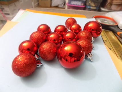 14 red small Christmas ornaments some glittery, some satiny 2 sizes