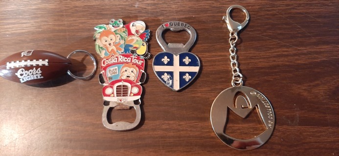 Four Collectible Bottle Openers