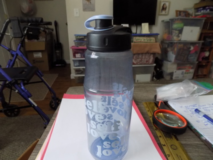 Cool Gear blue water bottle 10 inch tall says Self Love