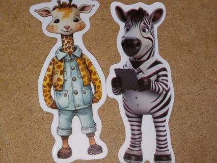 Two Cute new vinyl lap top stickers no refunds regular mail very nice quality
