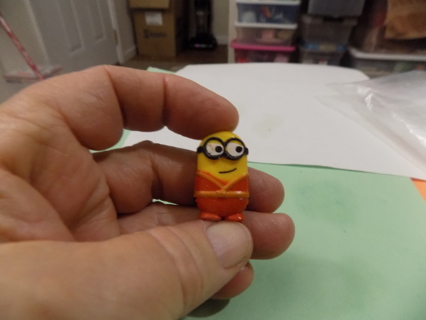 1inch Minion eraser dressed in red clothes has 2 eyes