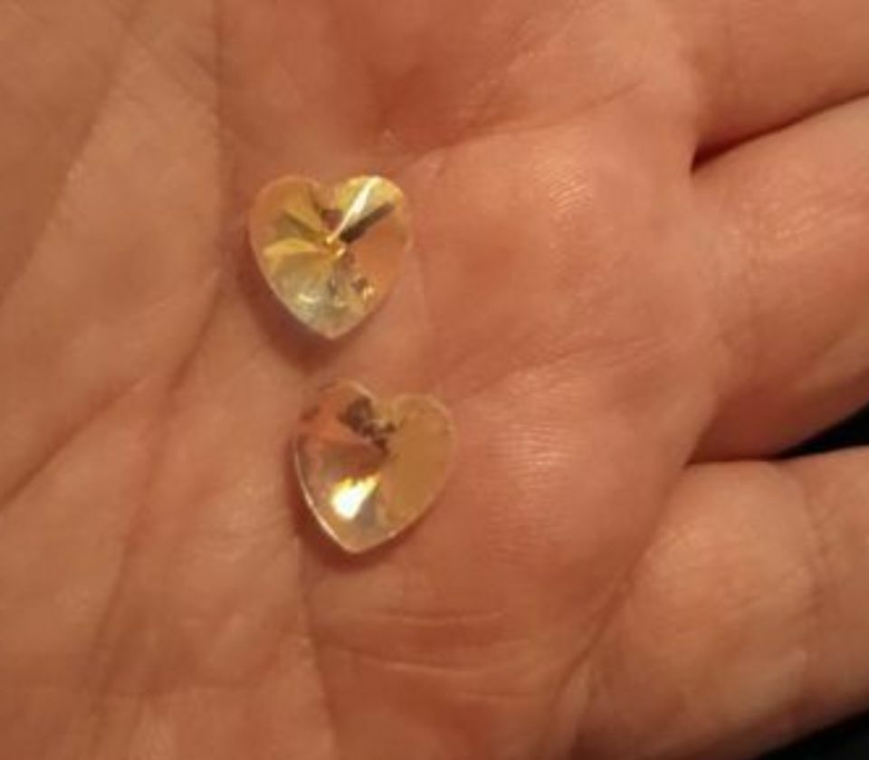 FREE: (2) Swarovski crystal heart charms
