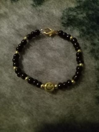 Smiley face black stone bracelet 5in new in pk or GIN FREE SHIPPING