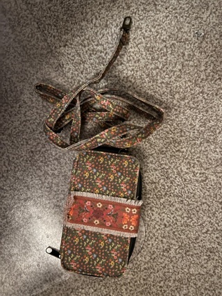 Wallet with flower pattern and purse strap