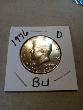 1976-D BEAUTIFUL UNCIRCULATED KENNEDY HALF DOLLAR.. HIGHEST BIDDER WINS