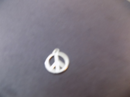 Silvertone peace sign inside a circle charm
