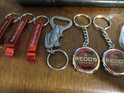 9 Keyrings bottle openers