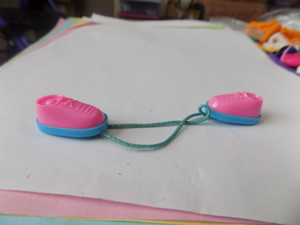 Pink and blue doll shoe shaped pony tail holders