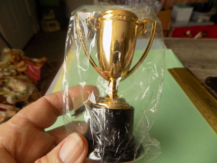 NIP miniature plastic trophy cup award 4 inch gold on black base