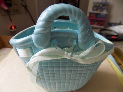 Ceramic blue basket decoration 5 inch tall and wide trim in blue satin ribbon