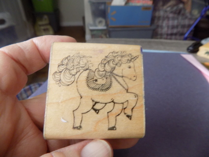 Wood mount rubber stamp 2 inch unicorn with a saddle