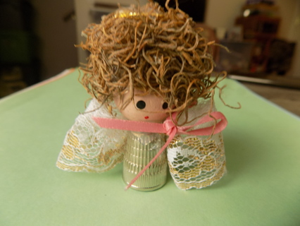 hand made angel ornament body is a metal thimble, bead head, lace wings brown curly hair