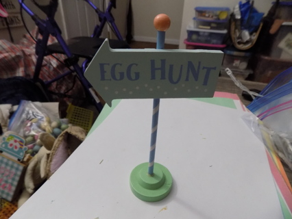 6 1/2 inch tall egg hunt sign on pole and green base