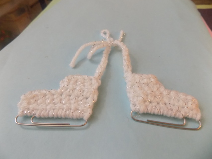 pair hand crocheted white and silver thread ice skates ornament with paper clip metal runner