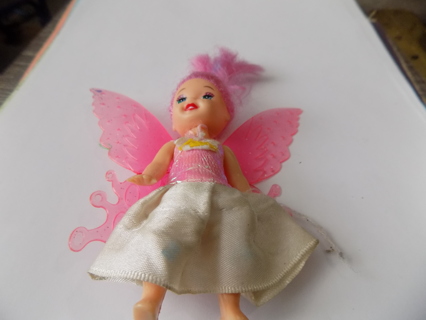 Kelly doll Barbies little sister dressed as fairy pink wings & hair, pink & white dress