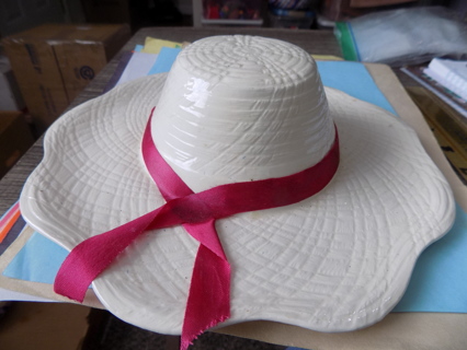 Vintage 9 inch round white ceramic straw hat wallhanging red ribbon around it