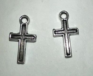 Two small silver tone crosses for earrings or charm bracelet