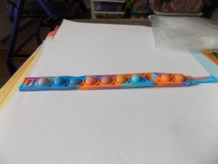 blue, orange and purple pop it bracelet