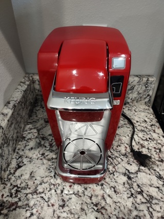Red Keurig coffee machine 