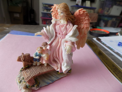 Resin guardian angel watching over 2 children crossing a bridge 4 inch tall