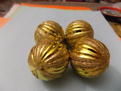 4 gold ribbed 2 inch ornaments