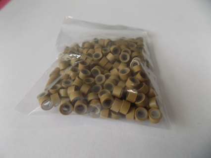 Tan 1/2 inch tube beads baggie