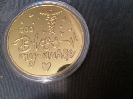 GOD BLESS MY WIFE  COIN IN PLASTIC CONTAINER 