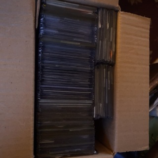 A mystery box of sports cards, numbered, colored, refractor, baseball football and basketball 