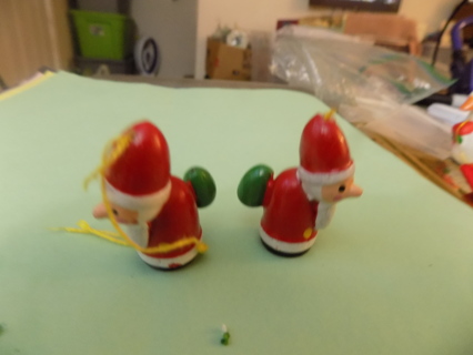 Set of 2 Wooden Santa with green pack on back