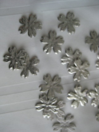 Shiny silver flower appliques, 16 pcs. sewing, embellishments, new out of bag.