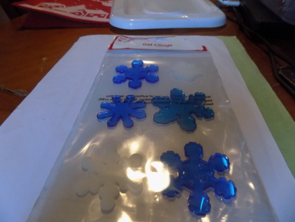 NIP window gel clings blue snowflakes,