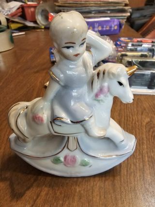 Vintage porcelain rocking horse