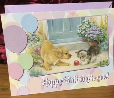 Puppy and Kitten Playing with Ball Birthday Card