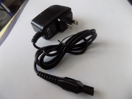 New Plug in adapter fits on 2 plug electrical devices