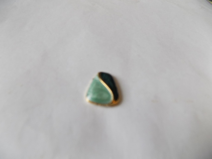1 inch tall sorta triangle shaped two tone green embellishment with gold wavy lines separating them