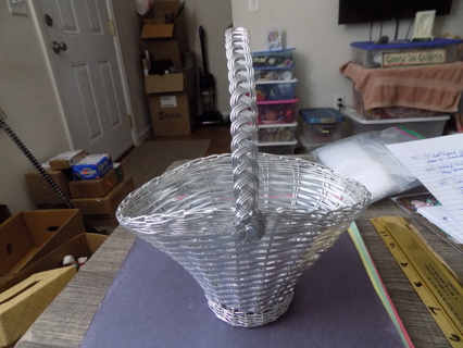 7 1/2 inch wide and 4 tall silver wire woven metal basket & braided handle