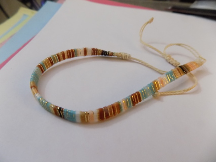 Woven cord adjustable Friendship bracelet brown, pink, blue stripes