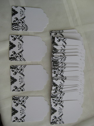 Hand die cut gift tags, 24 white tags with a black design. 2.75"x1.75", new