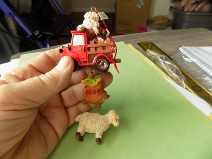 Resin Santa in red stake side  pick up truck ornament