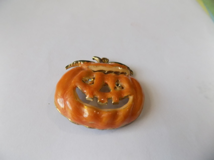 Metal enameled painted Jack A Lantern embellishment 1 3/4 wide