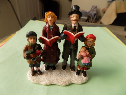 3 1/2 inch tall resin family caroling for a village scene colorful