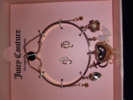 New in box Juicy Couture bracelet with charms and matching earrings