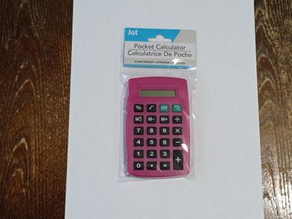 One new pink regular size calculator.