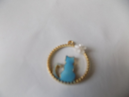 blue enamel cat charm in circle with flower on rim