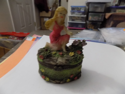 4 inch tall little girl hinged trinketbox in a flower garden