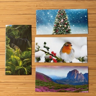 4 Seasonal Themed Envelopes -  recycled from calendarPages